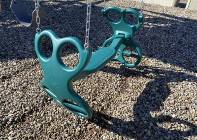 wooden playground with swing set