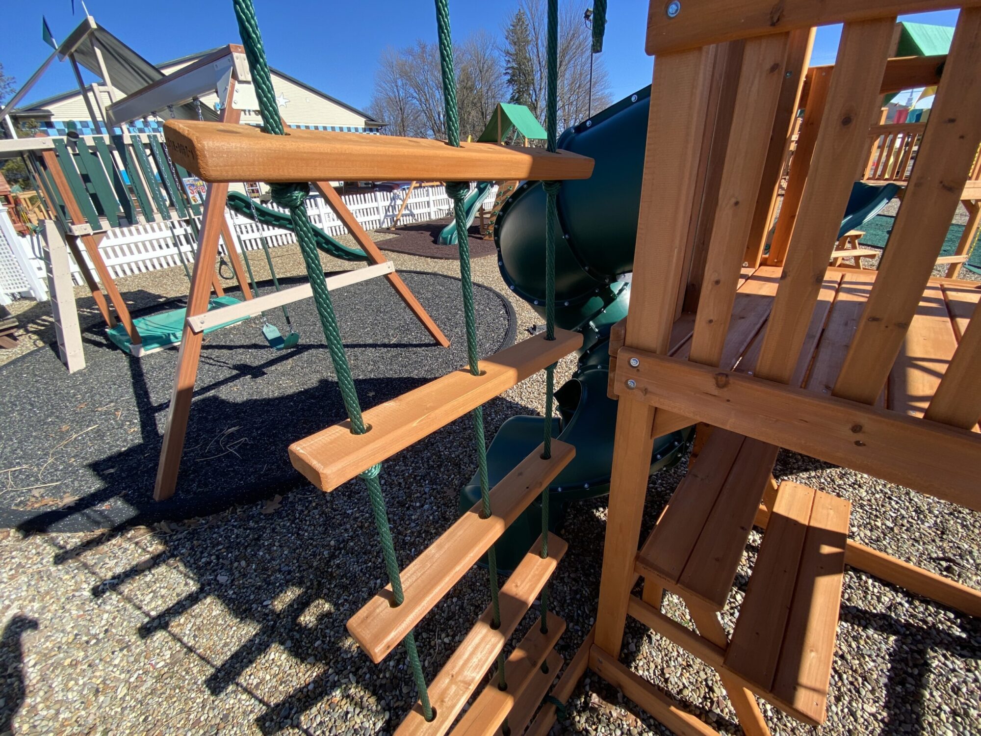 swing set with spiral slide and ladder