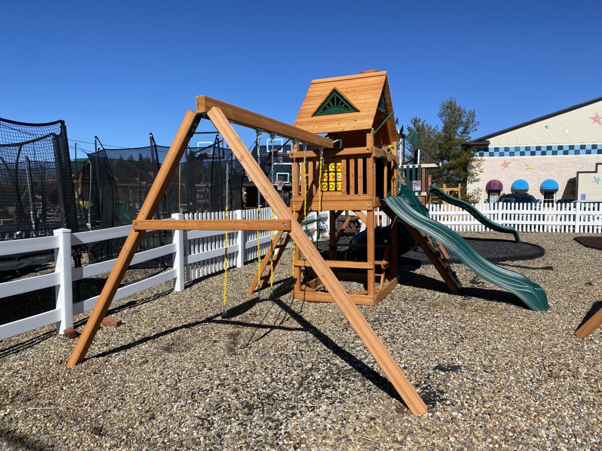 swing set with spiral slide with three swings