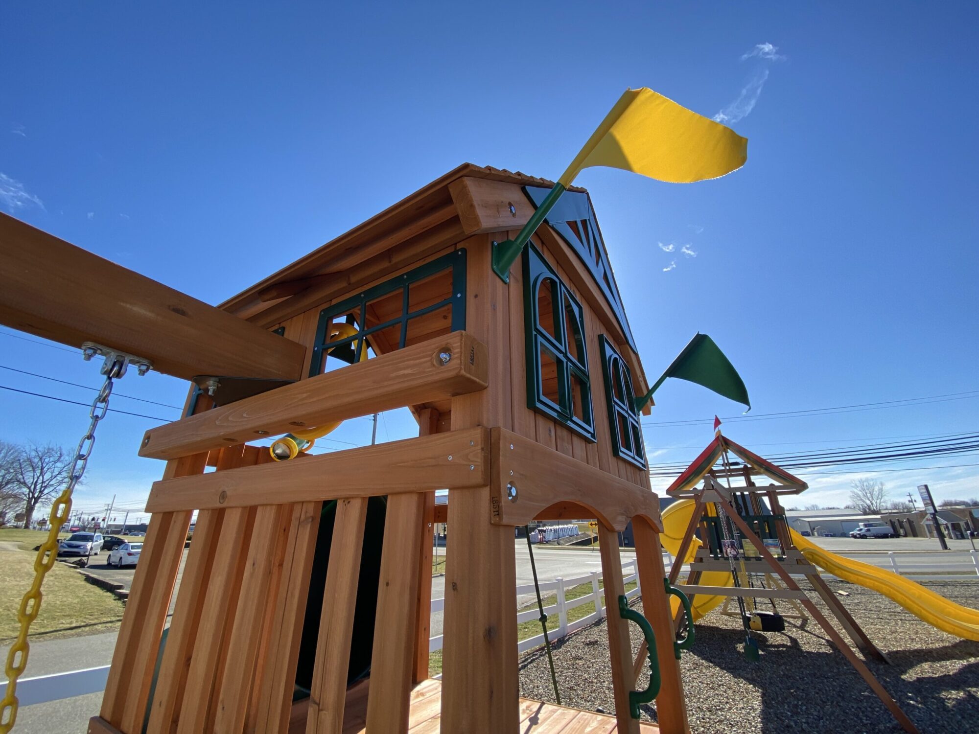 swing set with tube slide with flags