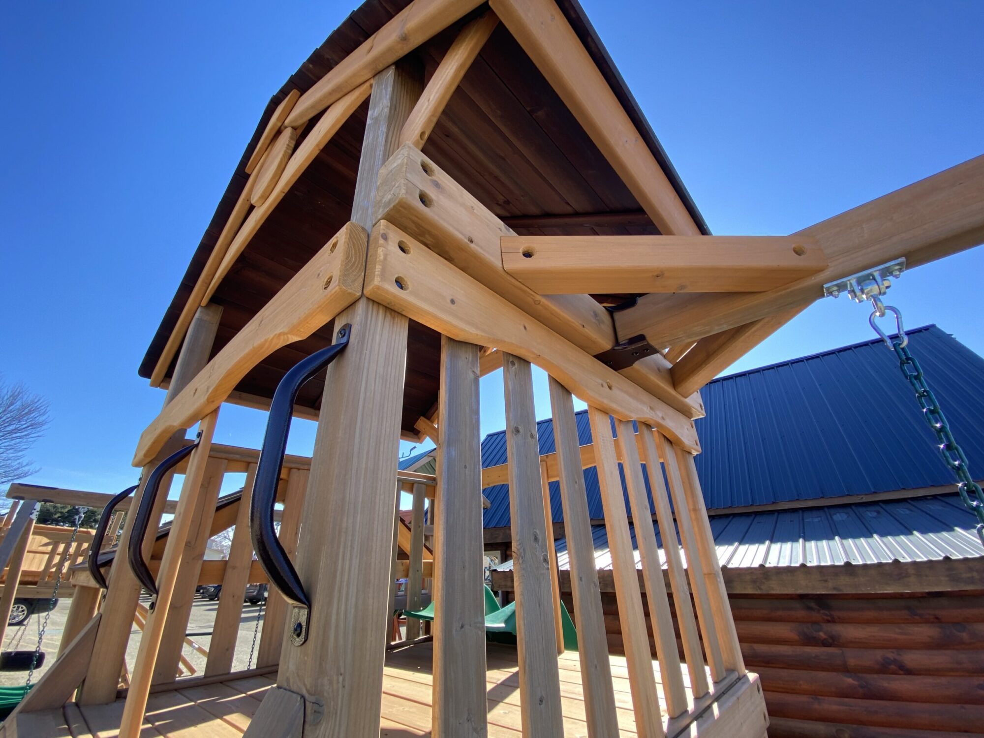 wooden swing set with slide on sale
